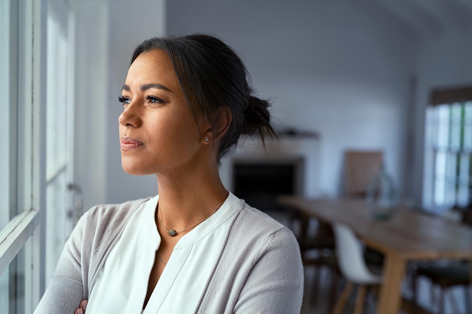 professional woman looking out window